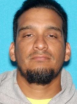 Jesse Navarro, 42, was named as the suspect in the fatal shooting of Riverside County Sheriff's Deputy Darnell Calhoun.
