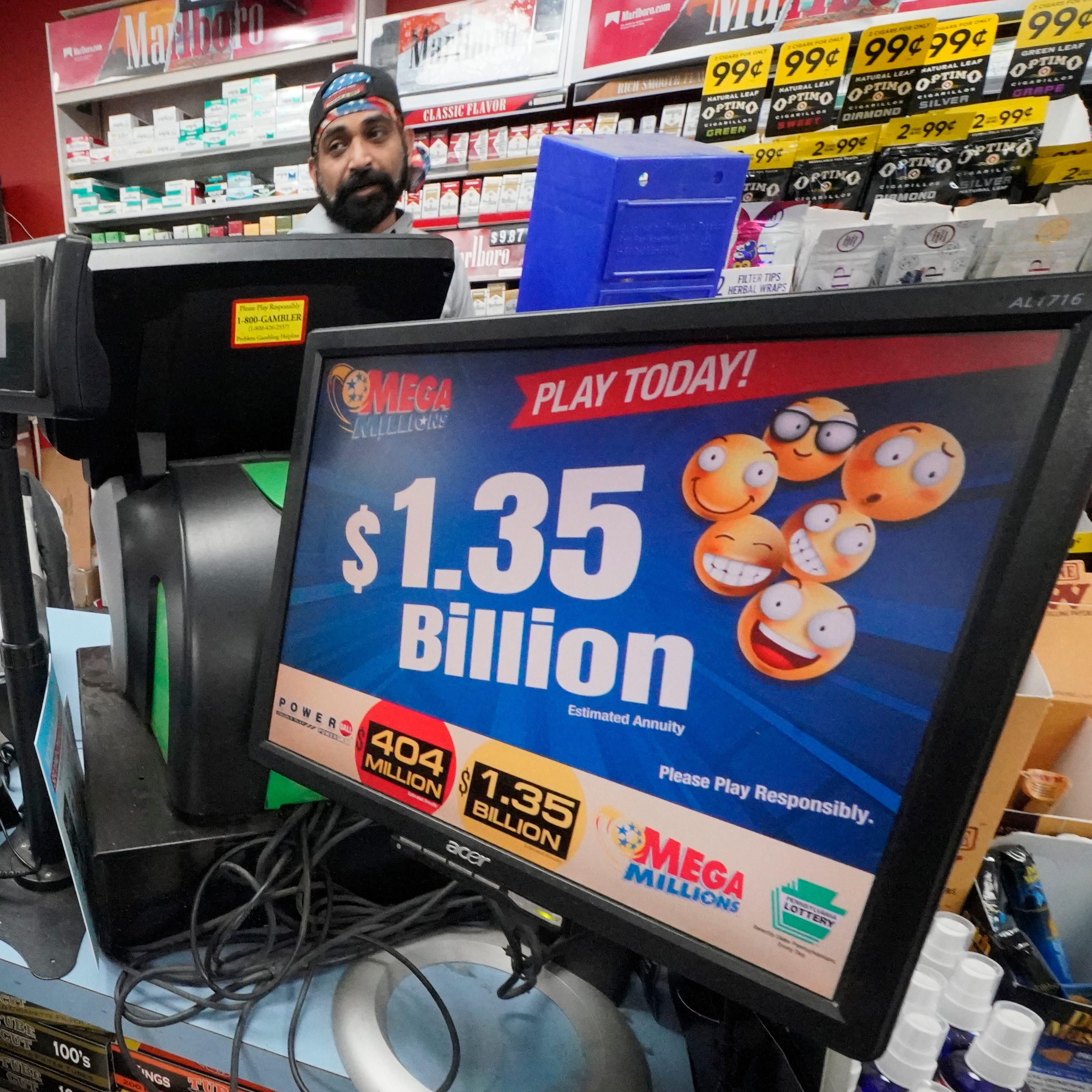 A Mega Million sign displays the estimated jackpot of $1.35 billion at the Cranberry Super Mini Mart in Cranberry, Pennsylvania, on Thursday, Jan. 12, 2023.  A ticket purchased in Maine matched the winning numbers for the lottery's grand prize on Friday, Jan. 13, 2023.