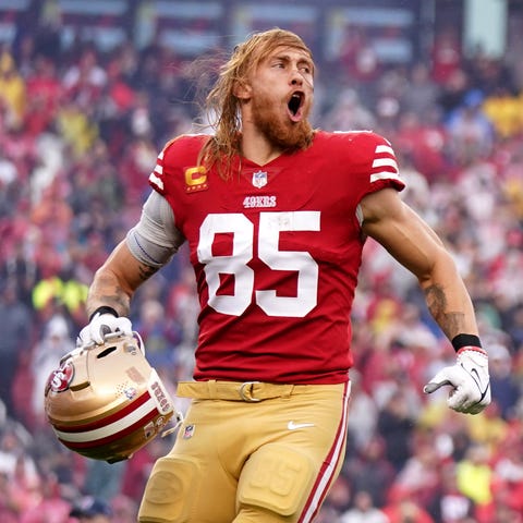 49ers tight end George Kittle takes the field befo