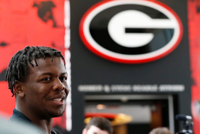 Georgia offensive lineman Warren McClendon speaks to the media on the first day of football practice ahead of the start of the season in Athens, Ga., on Thursday, Aug. 4, 2022.

News Joshua L Jones