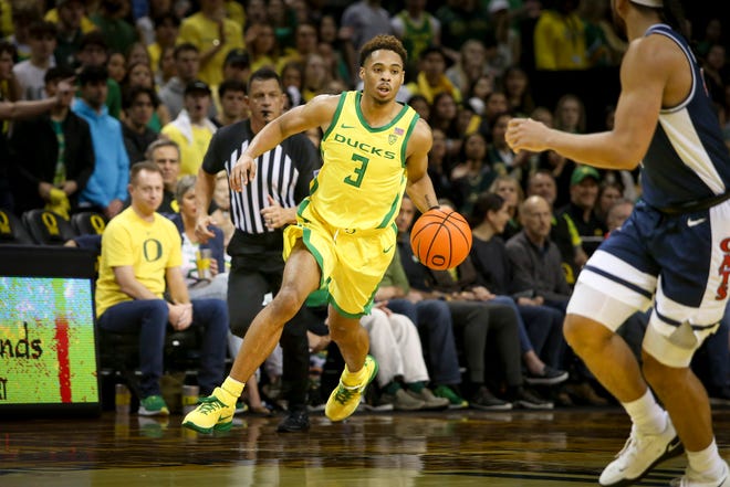 Oregon guard Keeshawn Barthelemy drives the ball up the court as the Oregon Ducks host the Arizona Wildcats Saturday, Jan. 14, 2023, at Matthew Knight Arena in Eugene, Ore. 
