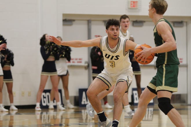 University of Illinois Springfield's Max Kunnert defends the ball against Missouri S&T during a Great Lakes Valley Conference men's basketball game at The Recreation and Athletic Center on Monday, Jan. 16, 2023.