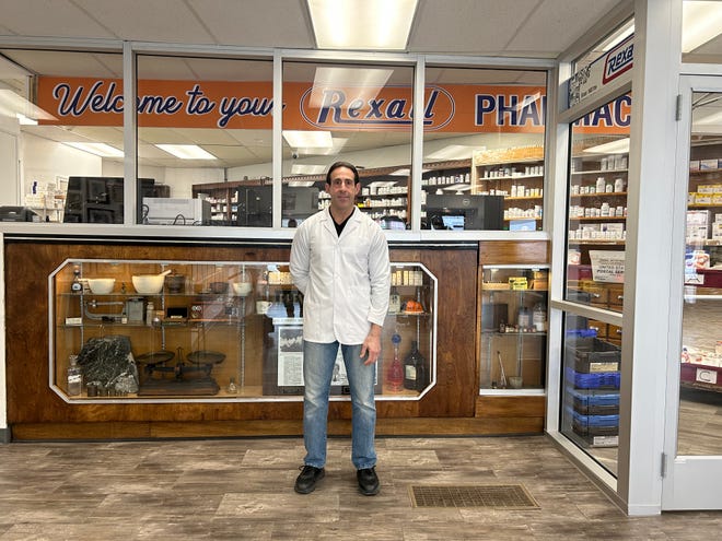 Bell Pharmacy co-owner Anthony Minniti has worked to bring the 91-year-old storefront's antique features back out. Soon, it will open Camden Apothecary, with medicinal and recreational marijuana sales.