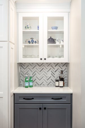 A dedicated beverage area provides easy access to wine, spirits, coffee, and other drinks.