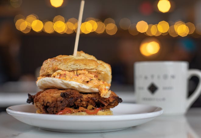 A chicken biscuit with a cup of coffee at Station, the new Granville café from Chris Crader