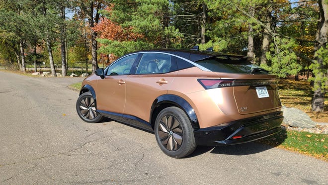 The copper, shard-like wheels of the 2023 Nissan Ariya complement the car's copper skin.