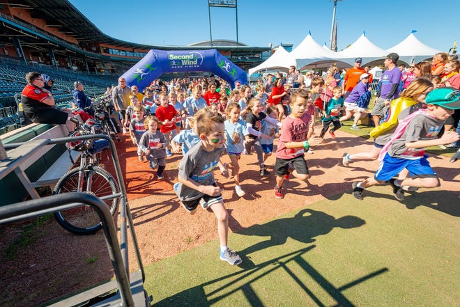 The 2023 Wolfson Children's Challenge fundraising races will be Jan. 28 at 121 Financial Ballpark in Jacksonville. Shown are runners taking off at an earlier challenge's 1-Mile Fun Run.