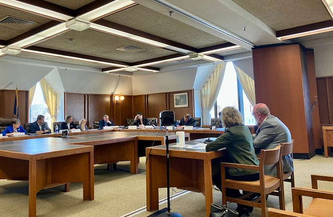 New Hampshire Retirement System Executive Director Jan Goodwin (left) and Director of Communications and Legislative Affairs Marty Karlon address members of the House Executive Departments and Administration Committee on Jan. 9, 2023.