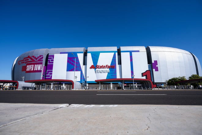 The front of State Farm Stadium is covered in a Super Bowl LVII logo in Glendale on Jan. 19, 2023.