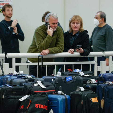 Stranded Southwest Airlines passengers looks for t
