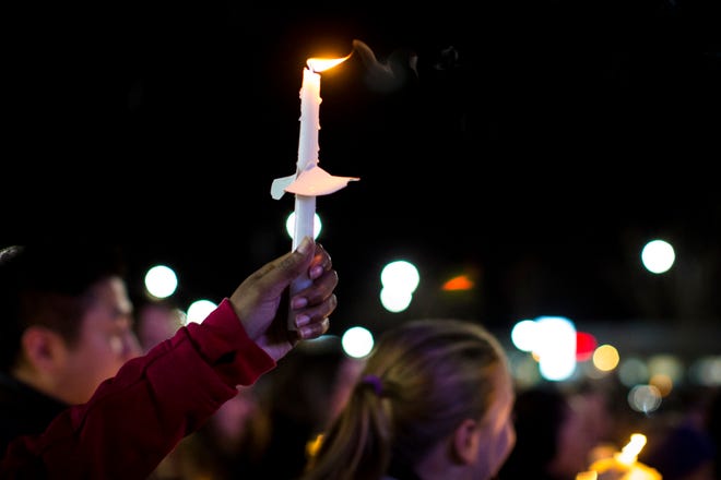 A candlelight vigil in honor of teacher Abby Zwerner in Newport News, Va., on Jan. 9, 2023. Zwerner, 25, was struck by a bullet through her hand and chest. Her attorney said she faces a lifetime of physical and psychological recovery.