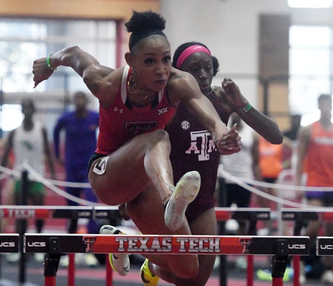 Demisha Roswell runs the 60-meter hurdles during Friday's Red Raider Open at the Sports Performance Center. Roswell broke the Texas Tech record for the second week in a row with a time of 7.98 seconds. Kentucky's Masai Russell broke the collegiate record in the same race by running 7.75.
