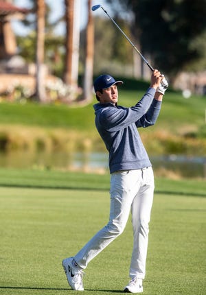 Davis Thompson watches his shot from the 18th fairway during round one of The American Express golf tournament at La Quinta Country Club in La Quinta, Calif., Thursday, Jan. 19, 2023. 