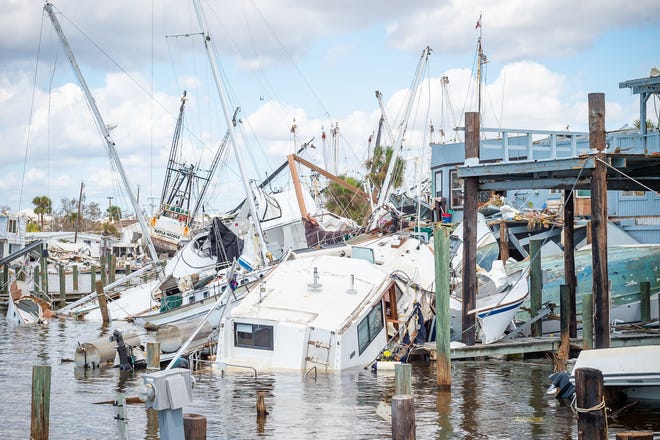 0468fc04-bad8-43aa-a7d4-da13281871af-XXX_IAN_boats_Matanzas_Pass___San_Carlos_Blvd_Ft_Myers_26568.jp Colorado State 2023 hurricane forecast: Quieter season doable