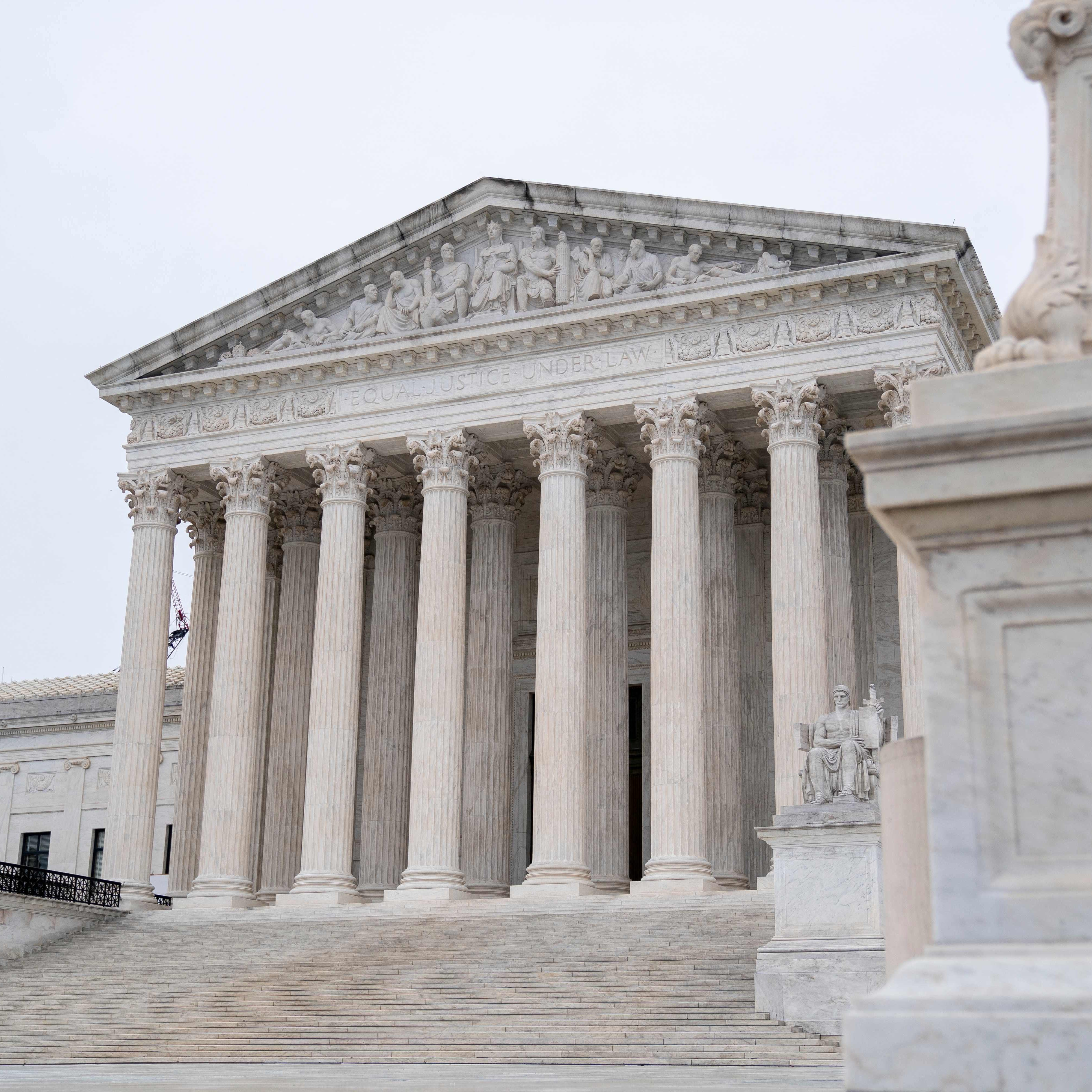 The US Supreme Court is seen in Washington, DC, on January 19, 2023. - The US Supreme Court said Thursday that an eight-month investigation that questioned 100 possible suspects had failed to find the source of the stunning leak last year of its draft abortion ruling. (Photo by Stefani Reynolds / AFP) (Photo by STEFANI REYNOLDS/AFP via Getty Images) ORIG FILE ID: AFP_337F6FJ.jpg