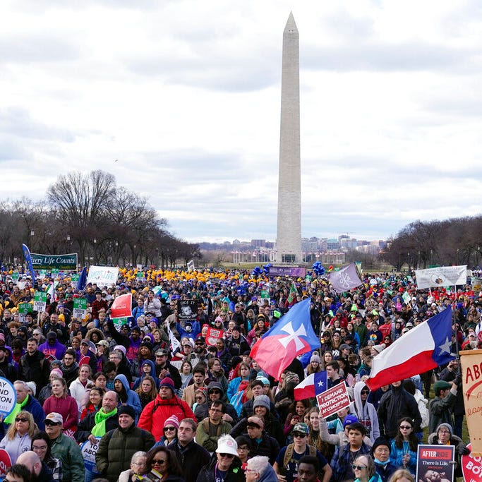 People participate in the March for Life rally in front of the Washington Monument, Friday, Jan. 20, 2023, in Washington.