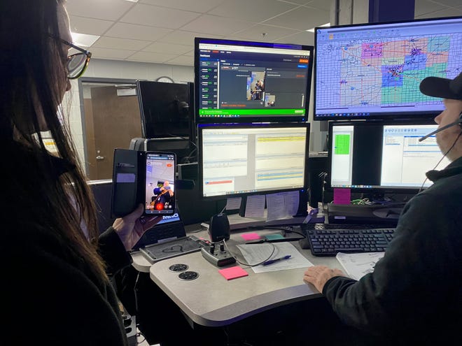 Sgt. Corrine Perdue, left, deputy director of Lenawee County Central Dispatch, and dispatcher Adam Daggs demonstrate how a dispatcher can access a 911 caller's smartphone to view live video on Monday, Jan. 16, 2023.