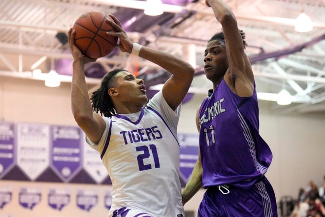Jan 21, 2023; Pickerington, Ohio, United States;  Pickerington Central’s Devin Royal (21) makes a shot while defended by Africentric’s Preston Steele (11) during the fourth quarter of the boys basketball game between Pickerington Central and Africentric at Pickerington H.S. Central on Saturday night. Mandatory Credit: Joseph Scheller-The Columbus Dispatch