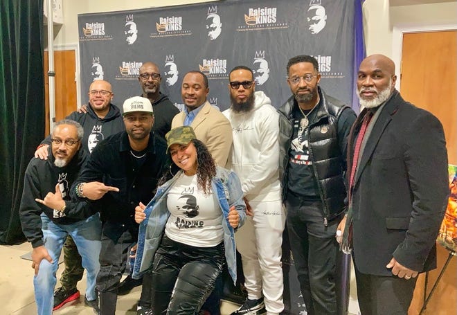 Panelists and event organizers pose for photos during One Alliance Village's 9th Annual Raising Kings Conference in Wilmington. The conference brings at-risk boys and accomplished men together to counter negative images and perceptions of Black men and boys.