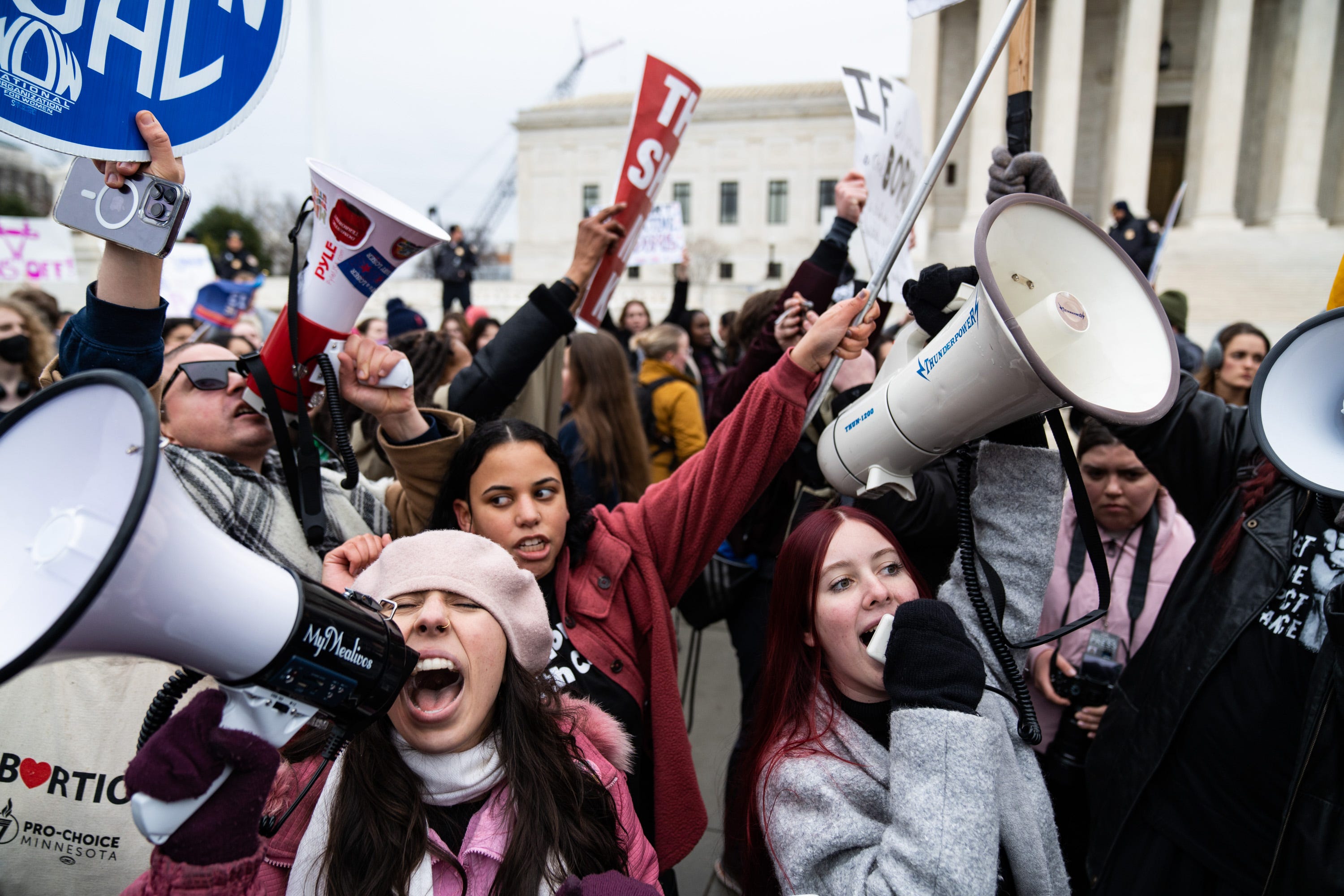 Abortion-rights and anti-abortion activists clash outside of the Supreme Court building after  participants of the Women's March walked there from the White House on January 22, 2023.