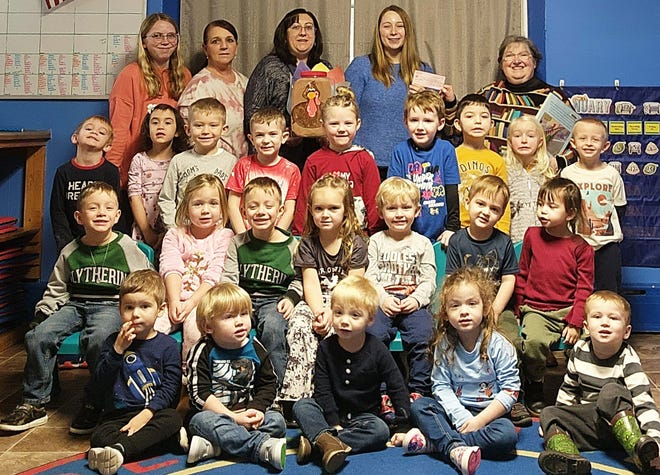 The students at the Learning Ladder Preschool in Meyersdale used the month of November to learn about the importance of giving by collecting money in Tom the Turkey cans to donate to a worthy cause. This year donations were presented to the Meyersdale Public Library. Director Terri Foster accepted the donation of $830 on Jan. 19, and thanked the students with a book reading. From left, front row are: Kalum Linares, Jax Kirchner, Asher Smith, Aubree Oravec, and Bristyn Lowery. Second row: Silas Sines, Aubrey Willison, Solomon Sines, Hadlee Teets, Eli Ferris, Will DiFebo and Chloe Martz. Third row: Noah Thomas, Evelyn Rowland, Everett Foreman, Bryson Wiltrout, Novalie Hodge, Bo Layton, Reed Bennett, Mira Thomas and Ezra Meekins. Fourth row: Carissa Miller, Debbie Day, Kristen Engle, Courtney Willison and Terri Foster.