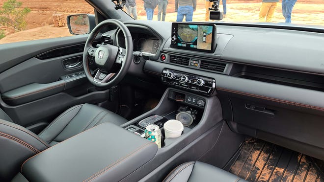 The remade interior of the 2023 Honda Pilot TrailSport follows the CR-V in its horizontal layout with a high-mounted tablet screen.