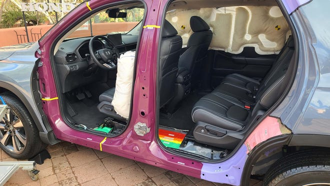 With little penetration into the cabin after a 37 mph side impact, the 2023 Honda Pilot TrailSport passed the IIHS test with flying colors (see the color code on the interior).