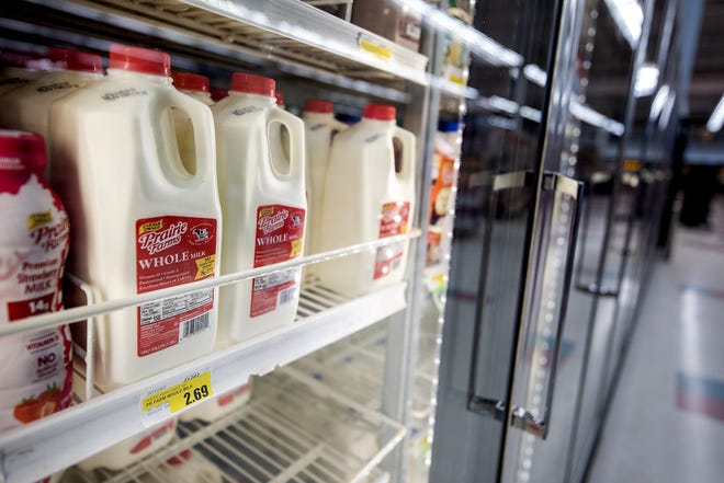Milk is stored on a shelf Wednesday, Nov. 2, 2022, at Piggly Wiggly grocery store in Edgerton, Wis.