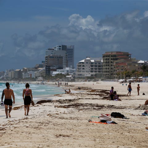 Tourists enjoy the beach in Cancun, Quintana Roo S