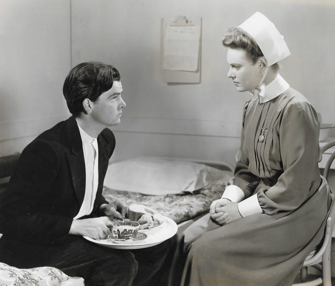 Akron-born actor Jimmy Butler appears in a scene with English actress Anna Neagle in the 1939 movie “Nurse Edith Cavell” from RKO Pictures.