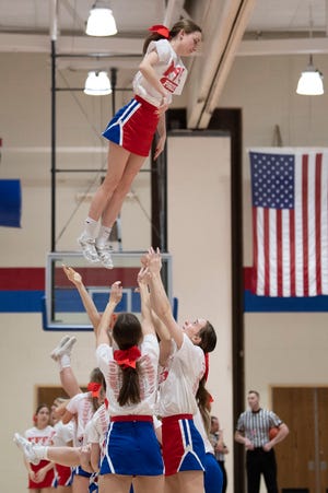 Nehsaminy cheer team performs during a timeout at Neshaminy High School on Tuesday, Jan. 24, 2023. Neshaminy fell to Pennsbury at home after overtime, 31-30.