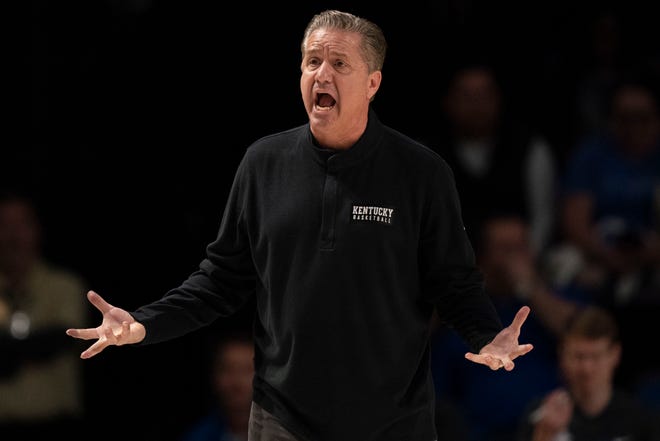 Kentucky head coach John Calipari yells toward a referee during the second half of a game against Vanderbilt at Memorial Gymnasium on Tuesday in Nashville, Tennessee. The Wildcats will face the Kansas Jayhawks on Saturday.