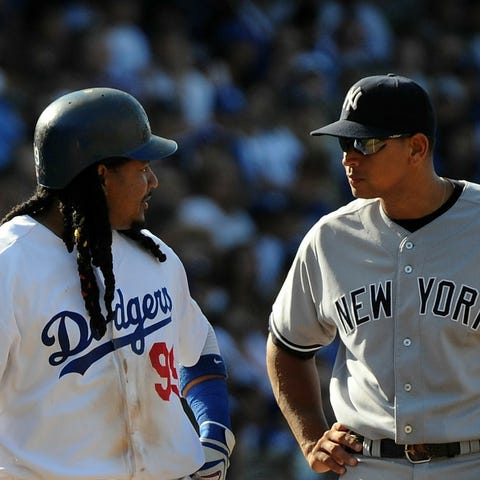 Manny Ramirez (left) of the Los Angeles Dodgers ta