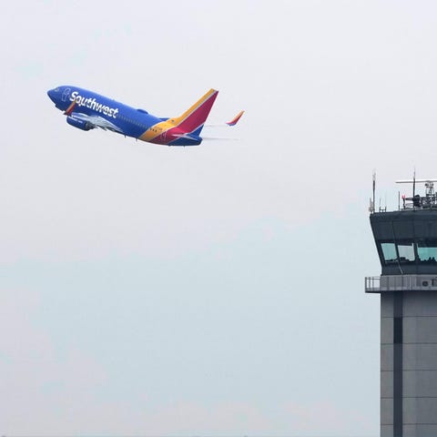 A Southwest Airlines passenger jet takes off from 