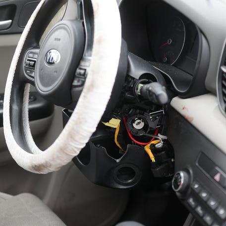Steering column damage to a Kia  after it was stolen and later recovered. 