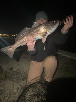 Local angler London Bush, did a little night fishing a couple weekends ago. Chilly temperatures were no match for her as she holds up another beautiful redfish.