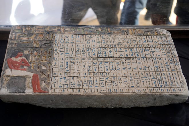 A recently discovered artifact is displayed at the site of the Step Pyramid of Djoser in Saqqara, 24 kilometers (15 miles) southwest of Cairo on Thursday.