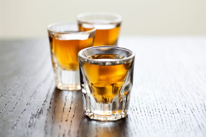 One way to ward off the ill effects of overindulgence is to alternative booze with non-boozy beverages.