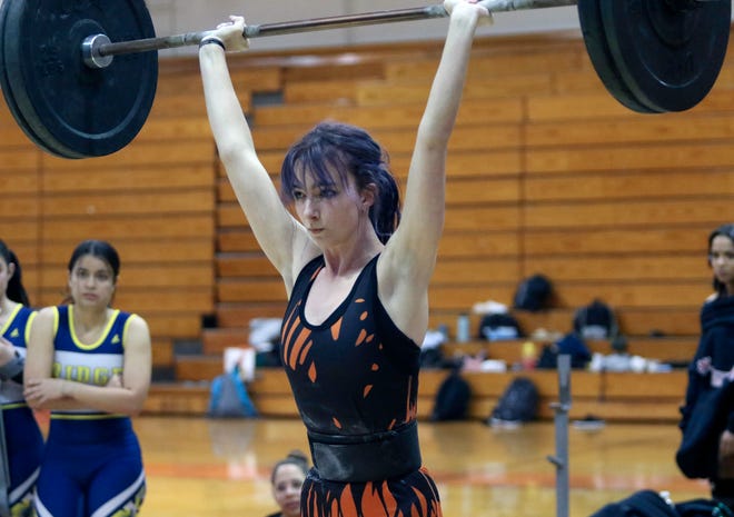 Lakeland's Sydney DeVoe completes a lift at 119 pounds. She won her weight class in both the Olympics and Traditional competitions on Thursday at the Class 3A, District 10 girls weightlifting meet.