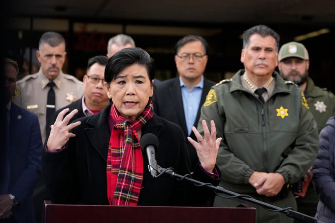 Rep. Judy Chu, D-Calif., addresses the news media with Los Angeles County Sheriff Robert Luna, right, in Monterey Park on Jan. 22, 2023 – right on Lunar New Year. The previous night, a man fatally shot 11 people and injured nine.