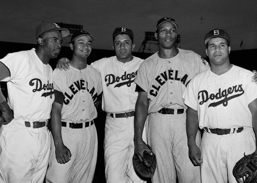 Left to right,  Jackie Robinson, Brooklyn; Larry Doby, Cleveland; Don Newcombe, Brooklyn; Luke Easter, Cleveland; and Roy Campanella, Brooklyn; pose at Ebbets Field in Brooklyn on July 24, 1950.