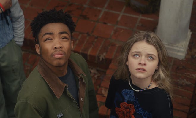 Asante Blackk and Kylie Rogers star as teens coming of age after aliens have taken over Earth in the sci-fi film "Landscape With Invisible Hand."