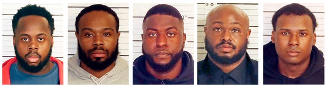 This combo of booking images provided by the Shelby County Sheriff's Office shows, from left, Tadarrius Bean, Demetrius Haley, Emmitt Martin III, Desmond Mills, Jr. and Justin Smith. The five former Memphis police officers have been charged with second-degree murder and other crimes in the arrest and death of Tyre Nichols, a Black motorist who died three days after a confrontation with the officers during a traffic stop, records showed Thursday, Jan. 26, 2023. (Shelby County Sheriff's Office via AP) ORG XMIT: TNHO202