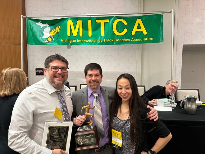 Saugatuck coaches Mario Diaz, Rick Bauer and Angelina Bauer at the MITCA awards.