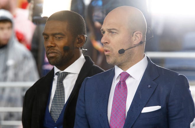 ESPN NFL analysts Randy Moss (left) and Matt Hasselbeck look on during pregame for the 2019 NFL Pro Bowl at Camping World Stadium.