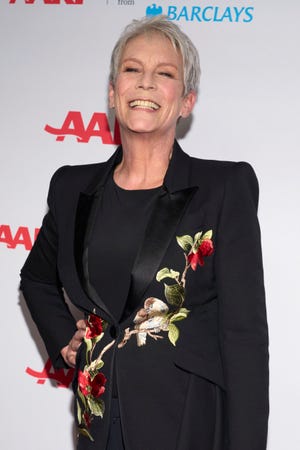 If there's anyone that can work a red carpet, it's Jamie Lee Curtis. The first-time Oscar nominee for her role in "Everything Everywhere All at Once" donned a classic black suit with floral embellishments for the AARP Movies for Grownups Awards on Jan 28.
