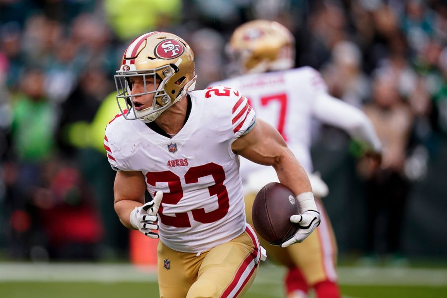 San Francisco 49ers running back Christian McCaffrey runs during the first half of the NFC championship game.