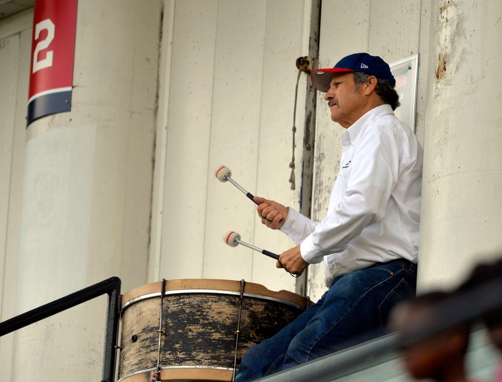 John Adams bangs his bass drum while seated in the bleachers in the first inning, June 2, 2016, at Progressive Field, in Cleveland.
