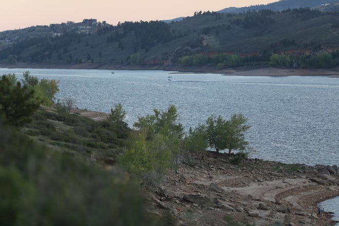 This photo of a Cessna plane flying dangerously close to a boat on Horsetooth Reservoir on Sept. 11, 2022, was used as evidence to charge the pilot with menacing and reckless endangerment.