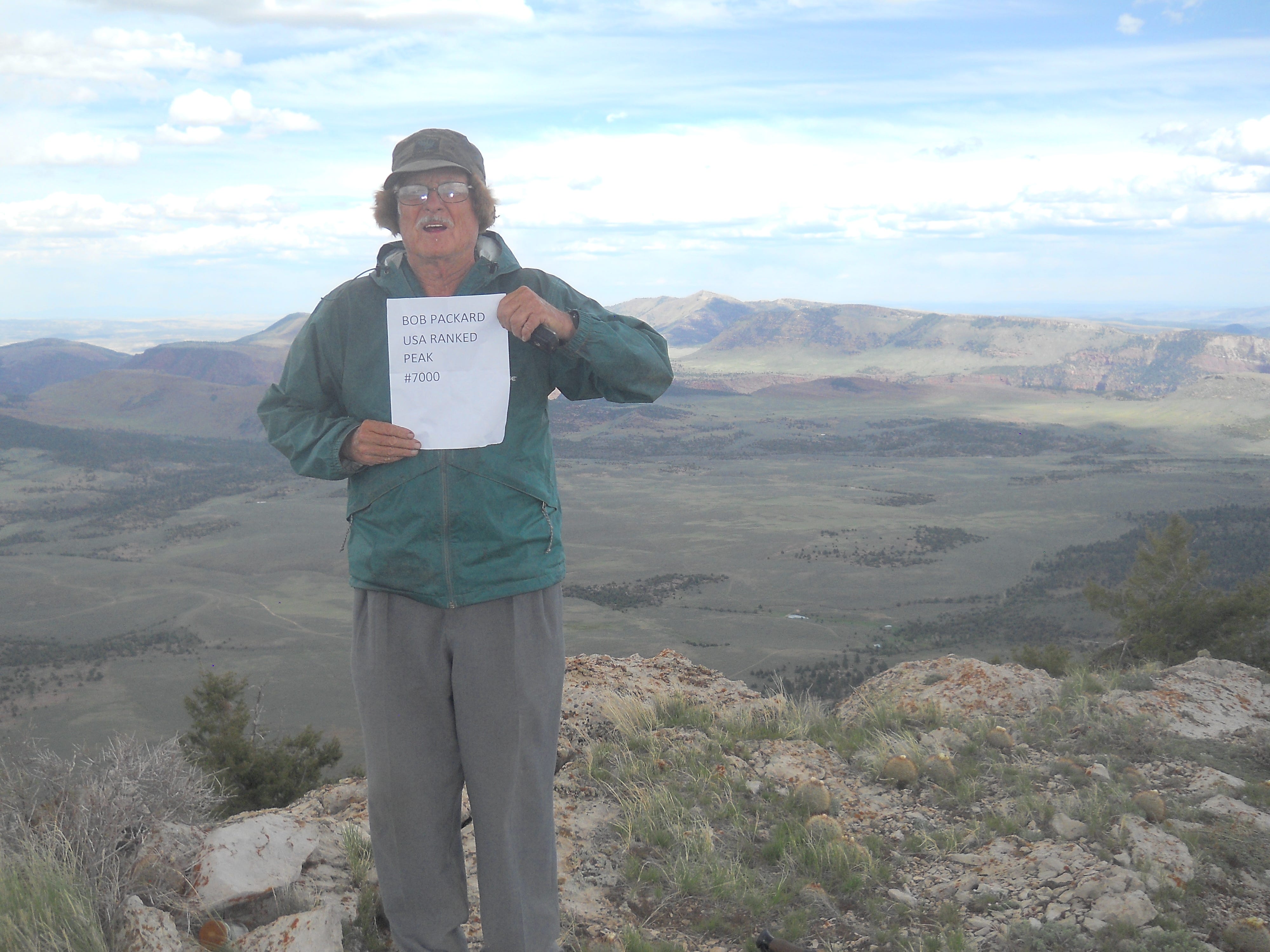 Robert Packard celebrates the 7,000th US Summit in Wild Mountain, Colorado on May 21, 2021.